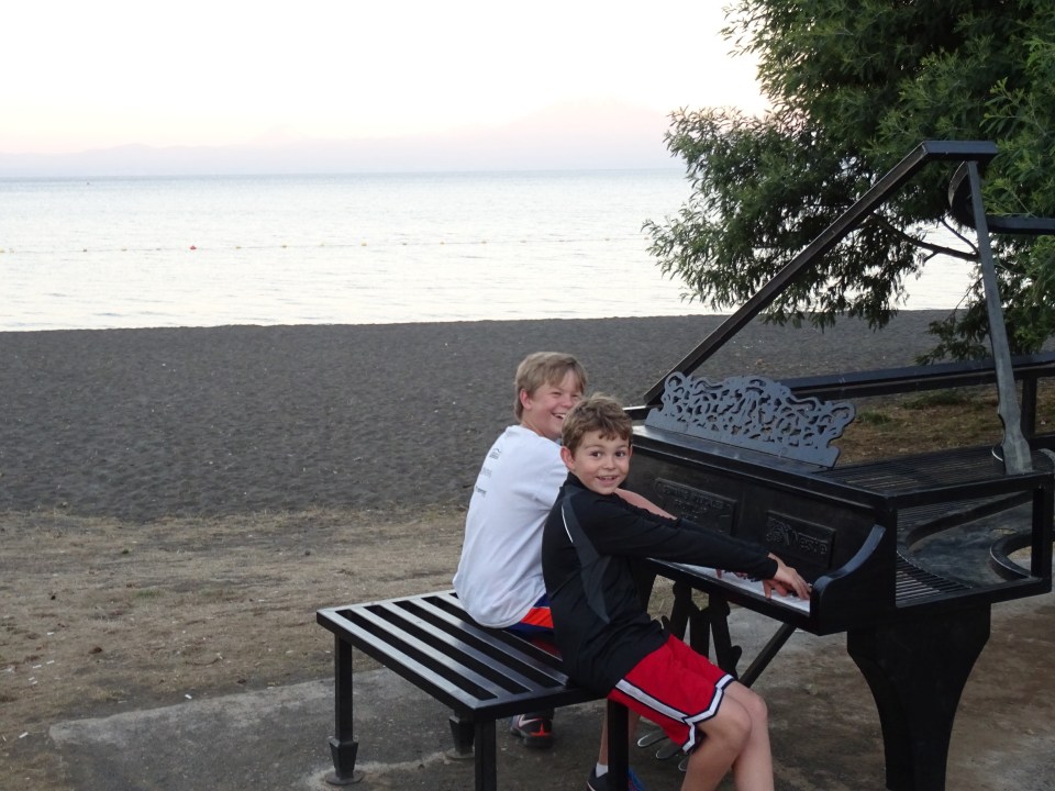 a metal piano near the beach.