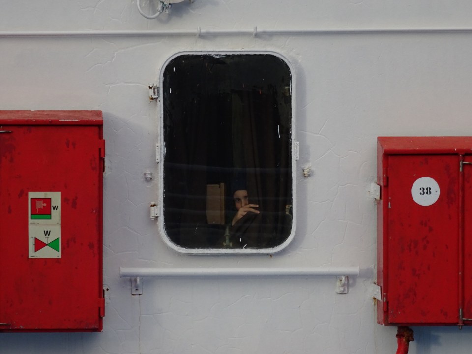 Gavin in the window - this is our forward looking room where we got to see all the action.