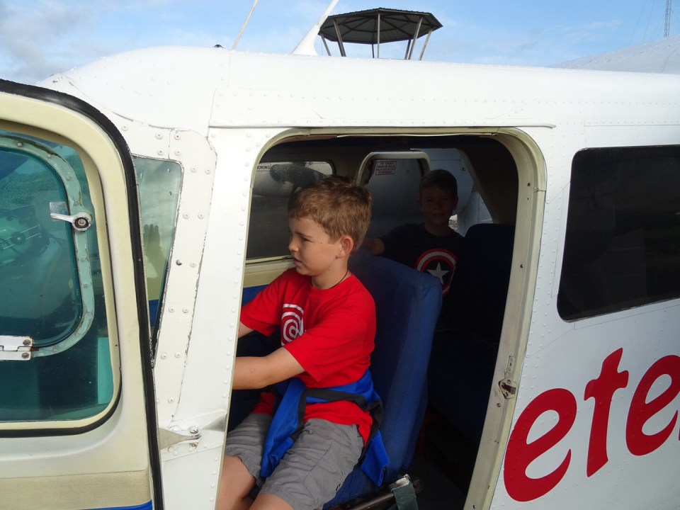 the boys were more than happy to go in the small plane.